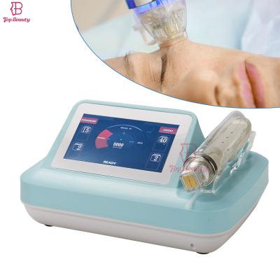 China Fractional Micro Needle Rf Skin Needling Machine For Face And Body for sale
