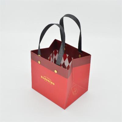 China Red New Year Gift Bag , 600g To 1600g Large Paper Carrier Bags for sale
