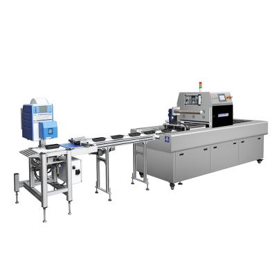 China Fruit And Vegetable Tray Packing Machine Skin Packaging Equipment Horizontal for sale