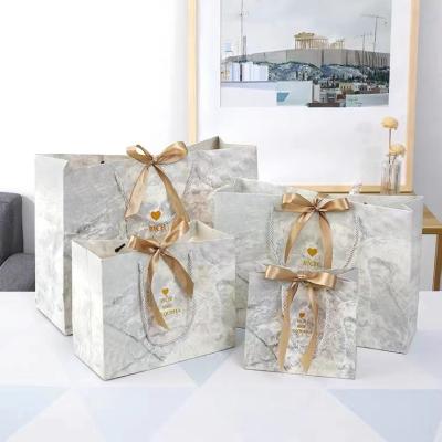 Chine Couleur de marbre blanche d'Art Paper Shopping Bag CMYK d'impression offset à vendre