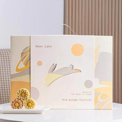 China Orange Coated Paper Foldable Gift Boxes With Ribbon Inserter Food Packaging for sale