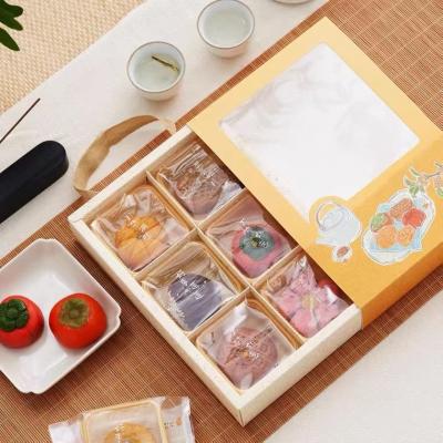 China Yellow Coated Paper Foldable Gift Boxes With Ribbon Paper Inserter For Food Packaging for sale