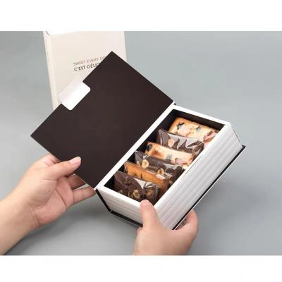 China Weiße Farbkunstpapier-Buch-Pappschachteln mit magnetischer EVA-Inserter-Geschenkverpackung zu verkaufen