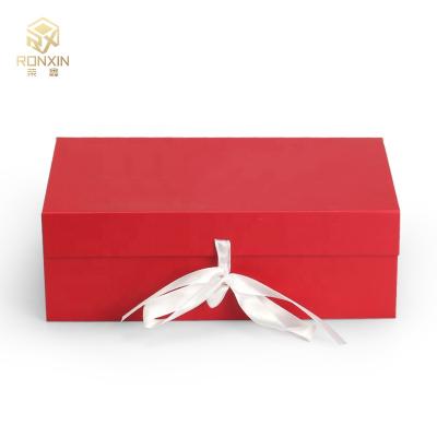 China Red Paperboard Foldable Gift Boxes With Ribbon Gift Packaging for sale