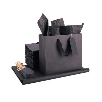 China 120g Fancy Printed Paper Shopping Bag 7'' pure black With Ribbon for sale