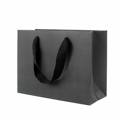 China Private Label 60gsm Printed Paper Shopping Bag Eco Kraft Gift Packaging for sale