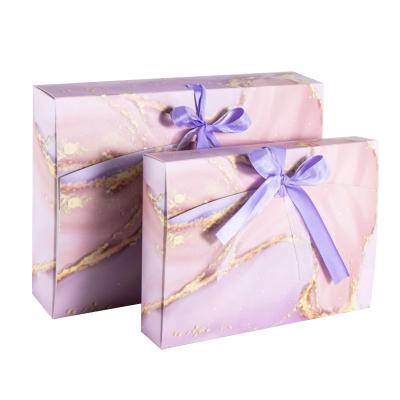China Recyclable Foldable Gift Boxes With Ribbon Clothing Packaging for sale