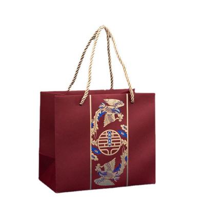 China Gift Packaging Printed Paper Shopping Bag With Handles Rope Recyclable for sale