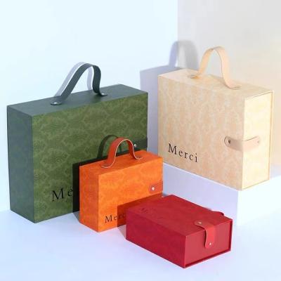 China Art Paper Magnetic Closure Gift Box With Handle Printing Logo for sale