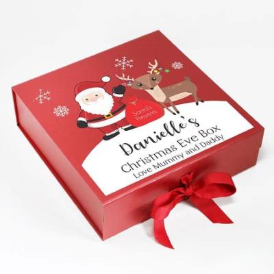 China Luxury Cosmetic Skincare Packaging Red Christmas Gift Box With Magnetic Fastening Flap for sale