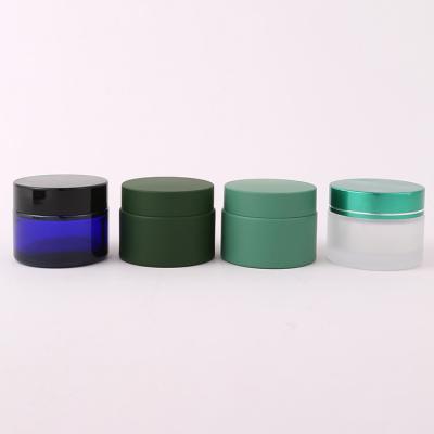 China Tarro poner crema de cristal de empaquetado 5g 10g 15g 30g 50g 100g de la botella de Matte Black Blue Green Cosmetic en venta