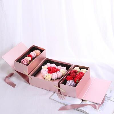 China Fold Pink Bouquet Innovative Biodegradable Packaging Matte Lamination With Ribbon for sale
