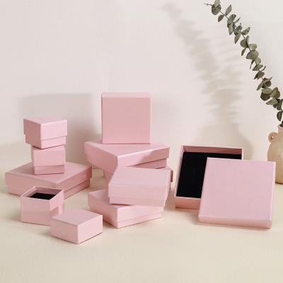 China Pink Jewelry Packaging Gift Box Heaven Earth Cover 100 PCS Bracelet Ring Earrings for sale