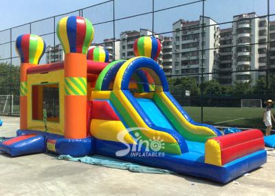 中国 4in1虹の商業子供の中スライドNのバスケットのたがが付いている膨脹可能な跳ね上がりの城 販売のため