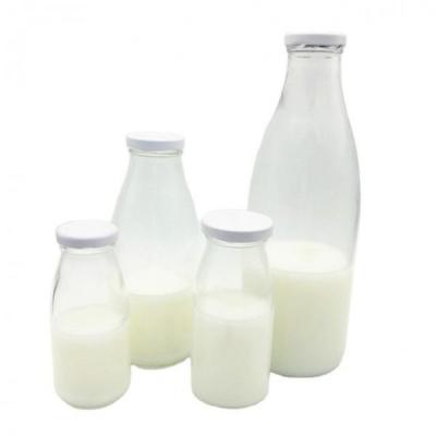 China Multi Size Glass Packaging Bottle Glass Milk Bottle With Metal Lid for sale