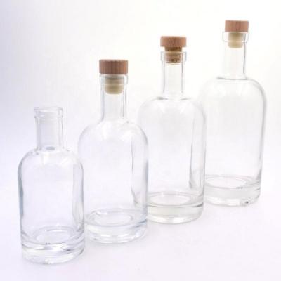 China Whisky Glass Packaging Bottle Transparent Safe Empty Glass Bottle for sale