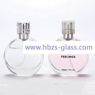 China Crystal Cosmetic Glass Bottle Mini Round Luxury Empty Refillable Atomizer Spray Glass Perfume Bottle for sale