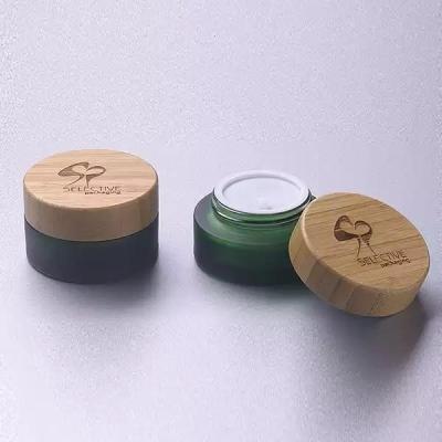China Durable Green Glass Jars Cosmetic Packaging Straight Sided Jars for sale