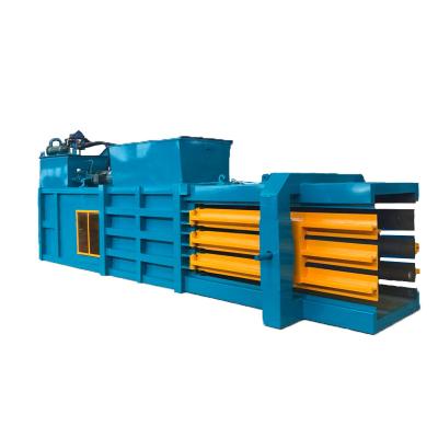 China Hot sell automatic horizontal baler for waste paper / cardboard /PET bottel/ Hydraulic press waste paper baler machine for sale