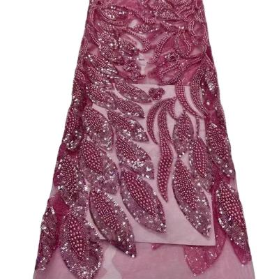 中国 Dubai top quality heavy Handmade embroidery beaded lace French bridal lace fabric bridal wedding dress french net lace Senegal 販売のため