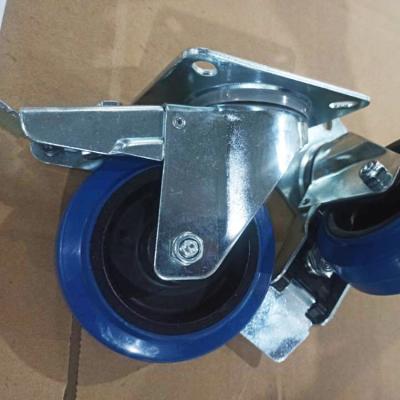 China 4 Inch Blue Wheel Swivel Elastic Rubber Casters With Brake Top Plate Soft Industrial Rubber Wheels for sale