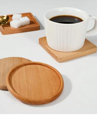 China Prácticos de costa de consumición en blanco de la taza de café de los prácticos de costa los 9cm cuadrados de madera de bambú de la bebida en venta