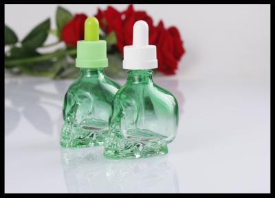 Cina bottiglia di vetro del contagoccia di forma del cranio 30ml del succo liquido di vetro della bottiglia E E in vendita