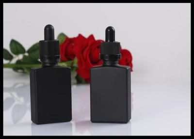 China Botellas de vidrio esmerilado mates negras de la botella de Droppe del aceite esencial del cuadrado de las botellas de cristal en venta
