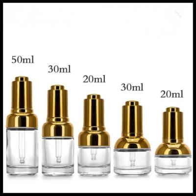 China Clear Glass Dropper Bottles Easy Carrying With Gold / Silver Press Lid Cap for sale