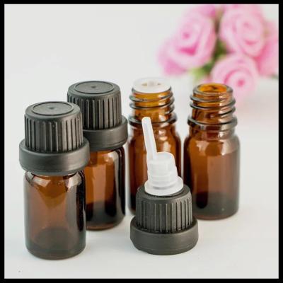 China 10ml Brown Essential Oil Glass Bottles With Anti Theft Black Head Inner Plug for sale