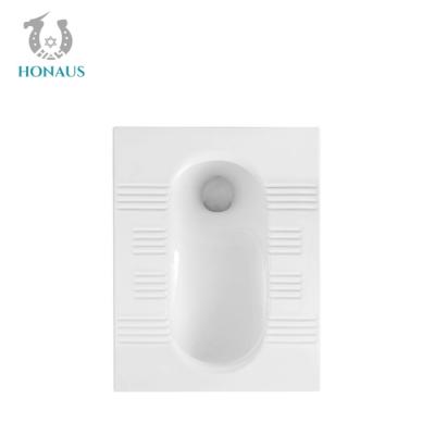 China Complete Set Ceramic Squat Pan Toilet Flushing Tank Odor Resistant Bathroom Toilet for sale
