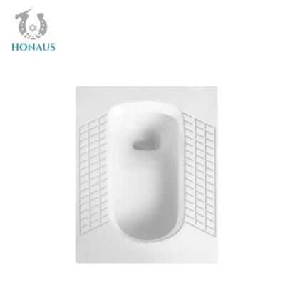 China Small Space Ceramic Squatting Pan Water Closet Bathroom Sanitary Ware Inodorous for sale