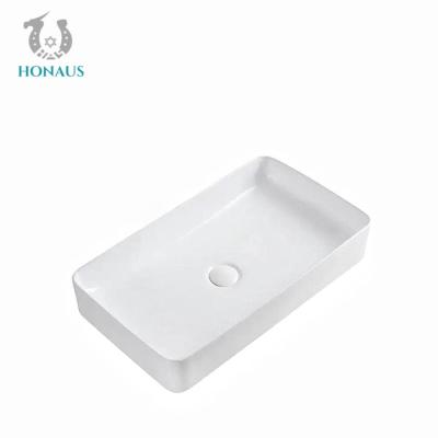 China Elegant White Bathroom Countertop Basin Rectangle Simple Design 610×340×110mm for sale