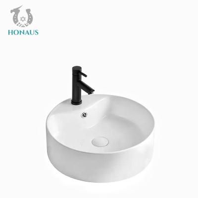 China Customized Round Countertop Bathroom Sinks 460mm Counter Mounted Wash Basin for sale