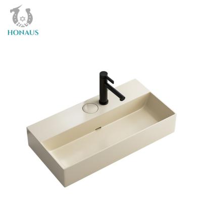 China Concealed Drainage Control Ceramic Counter Top Wash Basin Creamy Toned for sale