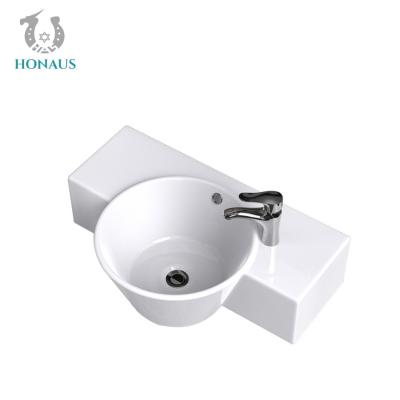 China Ceramic Glaze Bathroom Wall Hung Basin Wall Mounted Washbasin With Overflow for sale