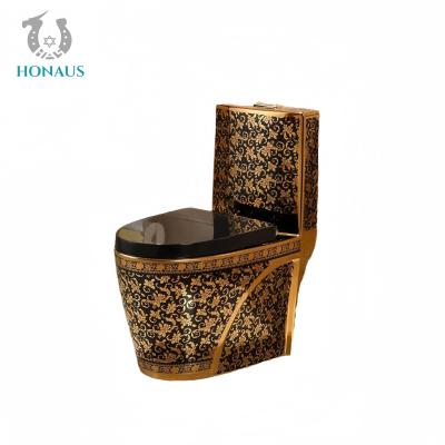 China Middle East Luxury Ceramic One Piece Toilet Bowl Golden Style Siphonic Dual Flush for sale