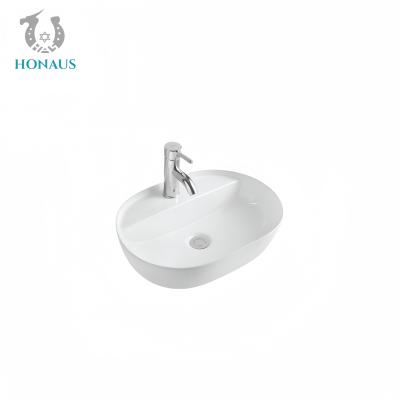 China Elegant Oval Bathroom Countertop Basin 1280 Degree Burned Ceramic Included 135mm for sale