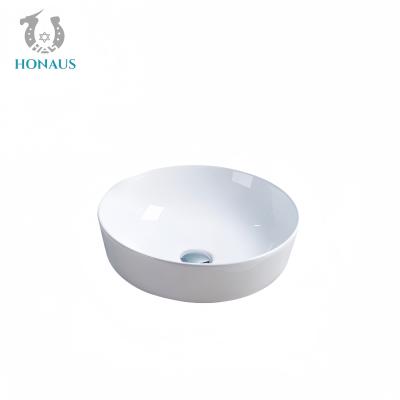 China Simple Bathroom Countertop Basin Round Deck Mounted Ceramic White for sale