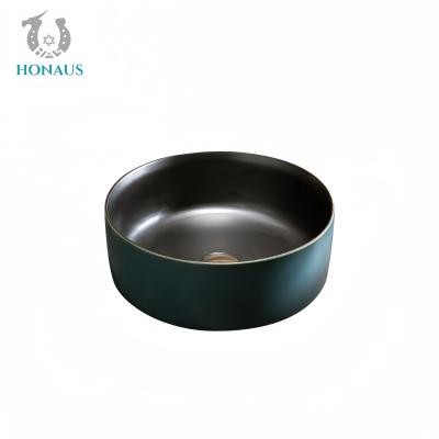 China Retro Bathroom Countertop Basin Round Best Ceramic Electroplated Surface Anti Stain en venta