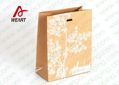 China Silk Screen Printing Brown Kraft Paper Gift Bags , Die Cut Rope Paper Goody Bags for sale