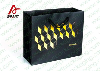 China Golden Hot Stamping Wedding Paper Gift Bags With Ribbon Handles for sale