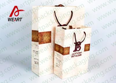 China Impresión media/pequeña del LOGOTIPO de la superficie del bolso del paquete del regalo con el algodón Hsndle en venta