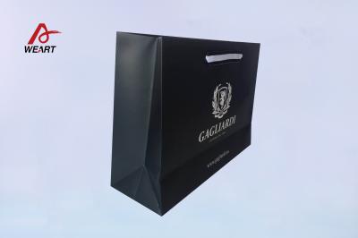 中国 カスタム印刷 アート紙バッグ エコナミー 白いギフトバッグ マットラミネーション 販売のため