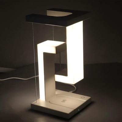China Modern PLA Magnetic Levitating Floating Wireless Led Light Desk Lamp for sale