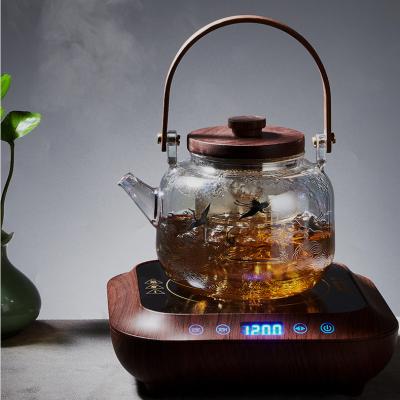 Chine Théière résistante à la chaleur en verre inodore de verrerie avec la poignée en bois lavable à vendre