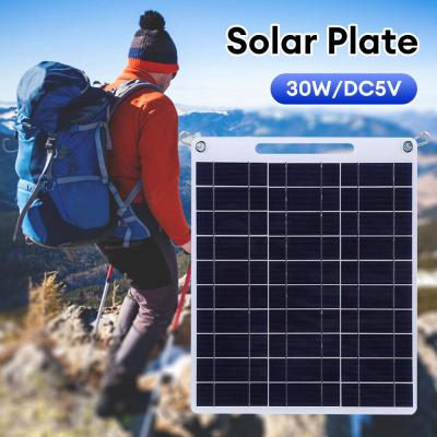 China Panel solar portátil de silicio policristalino plegable para senderismo módulo solar de 30W en venta