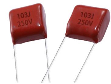 China Red 0.01 UF Metallized Polyester Film Capacitor Voltage Proof for sale