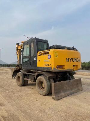 China Hyundai 150W-7 excavadora de segunda mano con 84KW de potencia del motor y 135000KG de peso operativo en venta