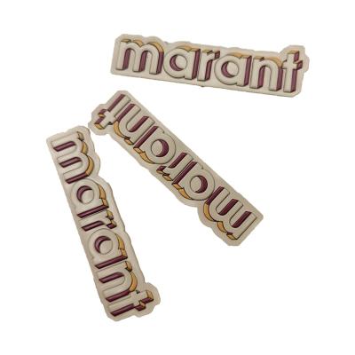 Китай Sustainable New Fashion Small MOQ Apparel Decorative Letter Embossed Pure Style Customized PVC Rubber Labels продается